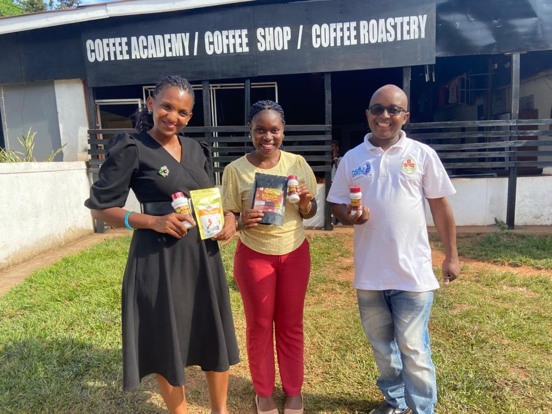 Kibajjo team members sharing packaged ginger products with local business partners